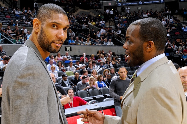 SAN ANTONIO, TX - MARCH 25: Tim Duncan #21 of the San Antonio Spurs, left, speaks to former teammate Malik Rose before a game against the Philadelphia 76ers at the AT&T Center on March 25, 2012 in San Antonio, Texas. NOTE TO USER: User expressly acknowledges and agrees that, by downloading and or using this photograph, user is consenting to the terms and conditions of the Getty Images License Agreement. Mandatory Copyright Notice: Copyright 2012 NBAE (Photos by D. Clarke Evans/NBAE via Getty Images)