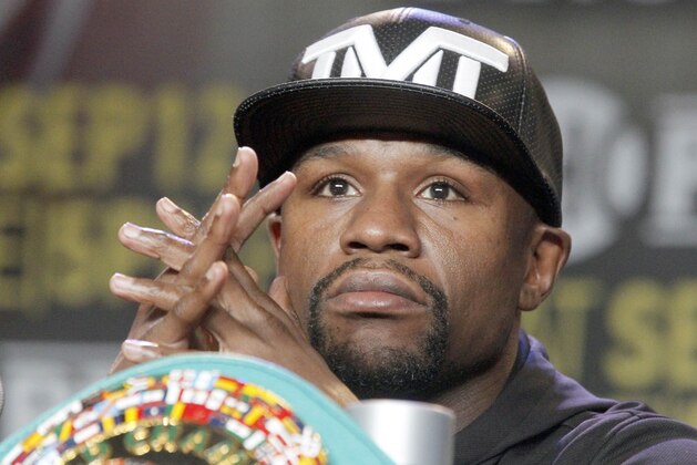 Floyd Mayweather Jr. takes questions during a news conference in Los Angeles on Thursday, Aug. 6, 2015. Mayweather is scheduled to face Andre Berto in a boxing bout Sept. 12 in Las Vegas. (AP Photo/Nick Ut) Floyd Mayweather Jr. takes questions during a news conference in Los Angeles on Thursday, Aug. 6, 2015. Mayweather is scheduled to face Andre Berto in a boxing bout Sept. 12 in Las Vegas. (AP Photo/Nick Ut)
