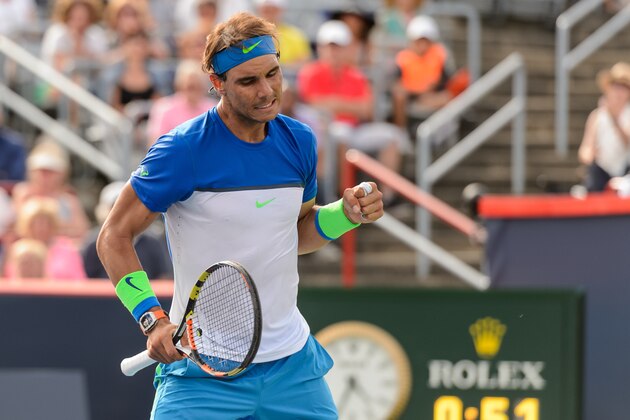 MONTREAL, ON - AUGUST 12:  Rafael Nadal of Spain celebrates a point against Sergiy Stakhovsky of Ukraine during day three of the Rogers Cup at Uniprix Stadium on August 12, 2015 in Montreal, Quebec, Canada.  Rafael Nadal defeated Sergiy Stakhovsky 7-6, 6-3.  (Photo by Minas Panagiotakis/Getty Images)