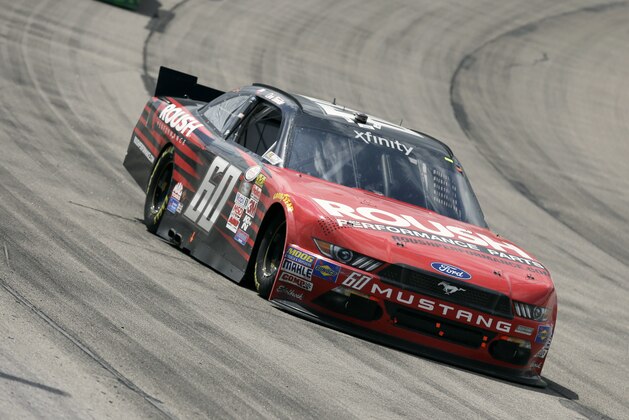 Chris Buescher races his car during the NASCAR Xfinity Series auto race, Sunday, May 17, 2015, at Iowa Speedway in Newton, Iowa. (AP Photo/Charlie Neibergall) Chris Buescher races his car during the NASCAR Xfinity Series auto race, Sunday, May 17, 2015, at Iowa Speedway in Newton, Iowa. (AP Photo/Charlie Neibergall)