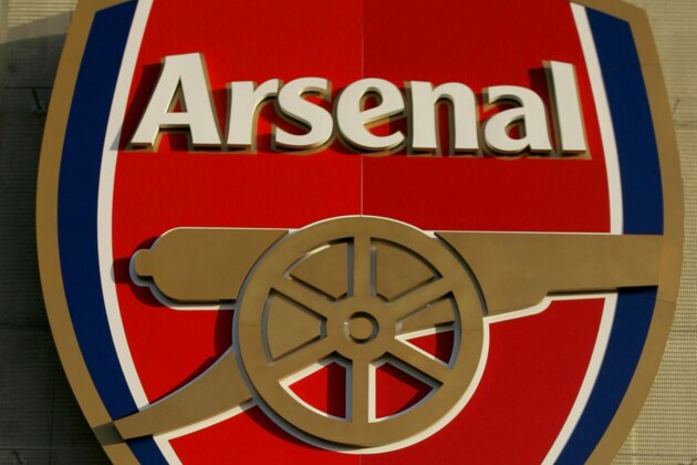 The club badge is seen on a section of Arsenal's Emirates Stadium in north London, Wednesday Dec. 6, 2006. Faint levels of radioactive polonium-210 have been found at two locations at the stadium, where Andrei Lugovoi, a key figure in the investigation of the death of the former Russian spy Alexander Litvinenko, attended a soccer match on Nov. 1, a British official said Wednesday.  (AP Photo/Matt Dunham)