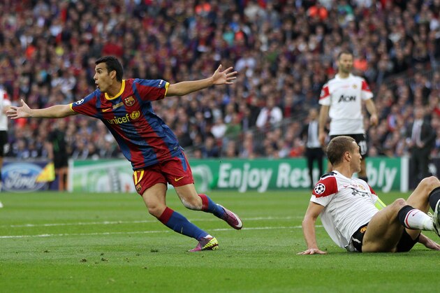 Barcelona's Spanish forward Pedro Rodriguez (L) celebrates after scoring a goal during the UEFA Champions League final football match FC Barcelona vs. Manchester United, on May 28, 2011 at Wembley stadium in London. AFP PHOTO / ADRIAN DENNIS (Photo credit should read ADRIAN DENNIS/AFP/Getty Images)