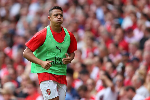LONDON, ENGLAND - AUGUST 09:  Alexis Sanchez of Arsenal warms up during the Barclays Premier League match between Arsenal and West Ham United at Emirates Stadium on August 9, 2015 in London, England.  (Photo by Catherine Ivill - AMA/Getty Images)