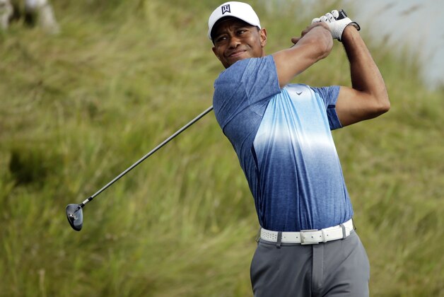 Tiger Woods hits on the 14th hole during the first round of the PGA Championship golf tournament Thursday, Aug. 13, 2015, at Whistling Straits in Haven, Wis. (AP Photo/Jae Hong)