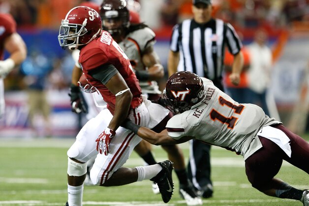 ATLANTA, GA - AUGUST 31:  Amari Cooper #9 of the Alabama Crimson Tide against Kendall Fuller #11 of the Virginia Tech Hokies at Georgia Dome on August 31, 2013 in Atlanta, Georgia.  (Photo by Kevin C. Cox/Getty Images)