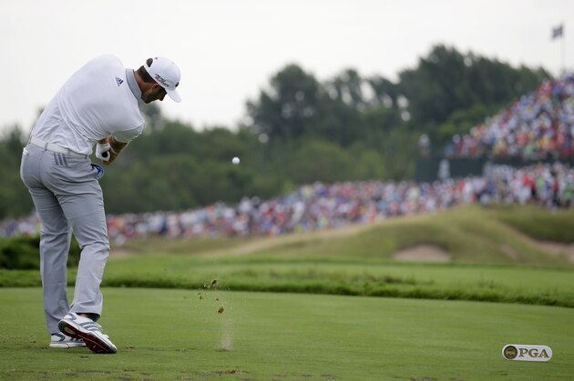 Dustin Johnson hits a tee shot on the 17th hole during the first round of the PGA Championship golf tournament Thursday, Aug. 13, 2015, at Whistling Straits in Haven, Wis. (AP Photo/Jae Hong)