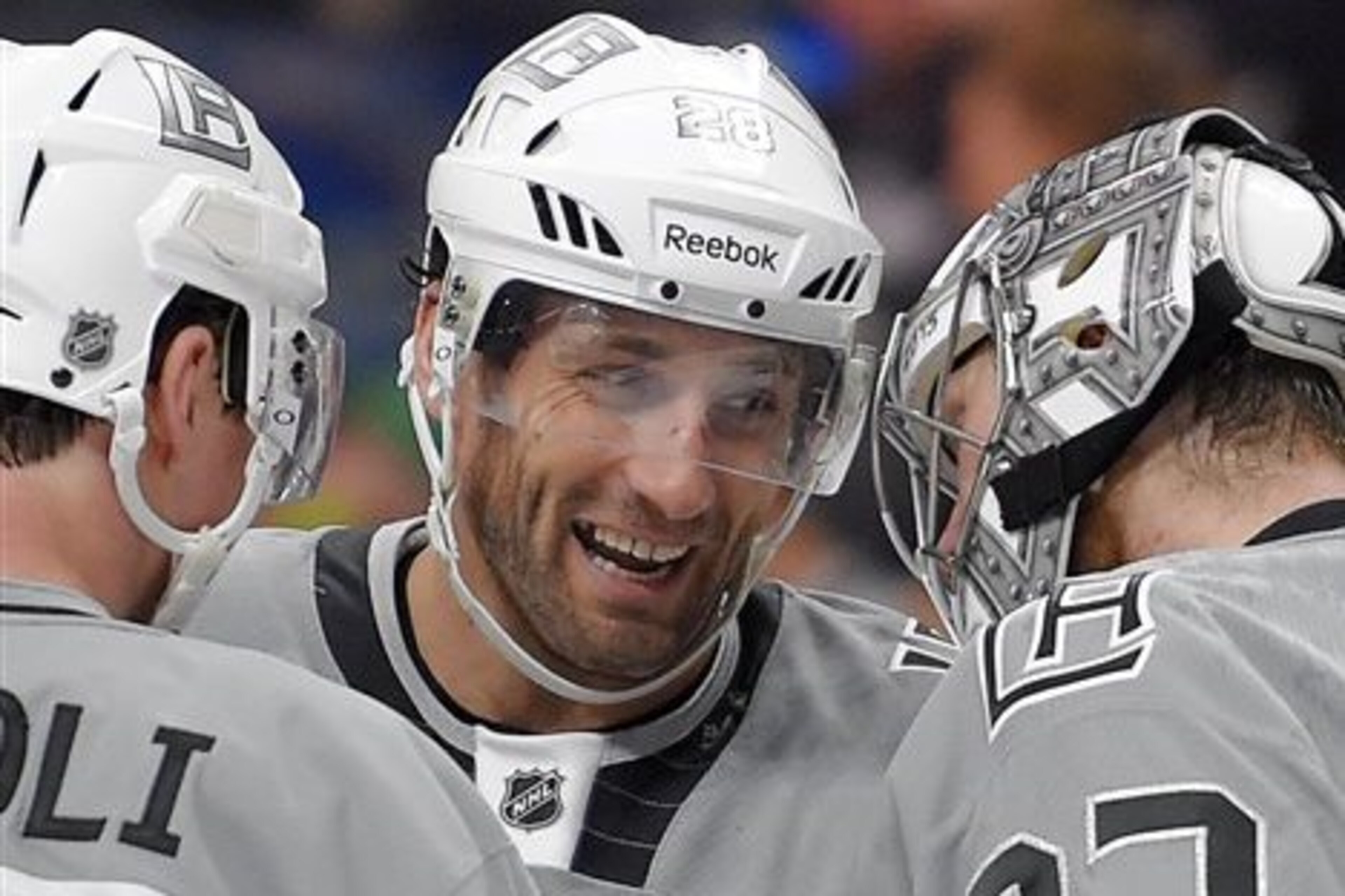 FILE - In this April 11, 2015, file photo, Los Angeles Kings center Jarret Stoll, center, congratulates goalie Jonathan Quick, right, as center Tyler Toffoli watches after an NHL hockey game against the San Jose Sharks in Los Angeles. Stoll was released on $5,000 bond from the Clark County Detention Center in Las Vegas on Friday night, April 17, 2015, KSNV-TV of Las Vegas reported.  He is accused of possession of controlled substances, including cocaine and Ecstasy. (AP Photo/Mark J. Terrill, File0