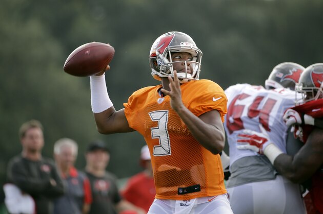 Tampa Bay Buccaneers quarterback Jameis Winston throws a pass during a Buccaneers NFL football training camp practice Tuesday, Aug. 4, 2015, in Tampa, Fla. (AP Photo/Chris O'Meara)