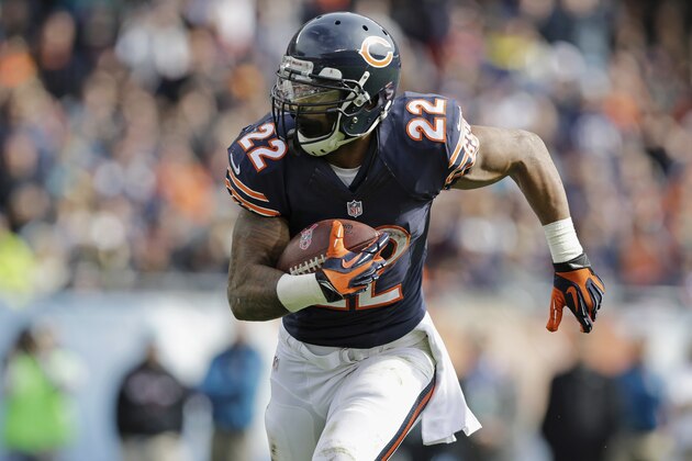 Chicago Bears running back Matt Forte (22) rushes for a touchdown against the Miami Dolphins during the second half of an NFL football game Sunday, Oct. 19, 2014 in Chicago. (AP Photo/Nam Y. Huh)
