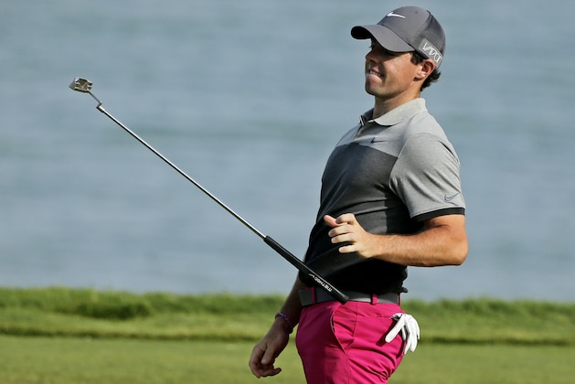 Rory McIlroy, of Northern Ireland, drops his putter after missing a putt on the 12th hole during the first round of the PGA Championship golf tournament Thursday, Aug. 13, 2015, at Whistling Straits in Haven, Wis. (AP Photo/Jae Hong)