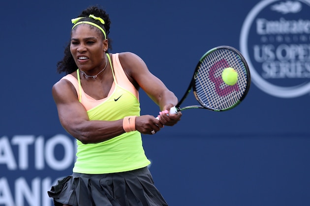 TORONTO, ON - AUGUST 11:  Serena Williams of the USA plays a shot against Flavia Pennetta of Italy during Day 2 of the Rogers Cup at the Aviva Centre on August 11, 2015 in Toronto, Ontario, Canada.  (Photo by Vaughn Ridley/Getty Images)