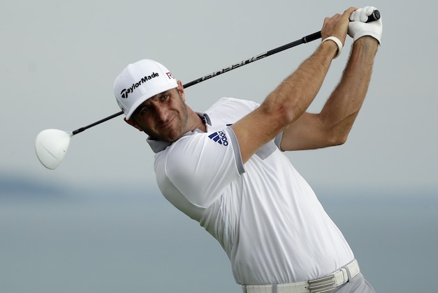 Dustin Johnson hits a drive on the 16th hole during the first round of the PGA Championship golf tournament Thursday, Aug. 13, 2015, at Whistling Straits in Haven, Wis. (AP Photo/Jae Hong)