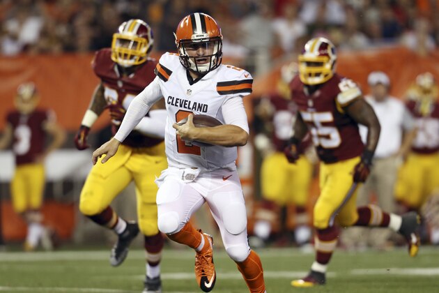 Cleveland Browns quarterback Johnny Manziel (2) scrambles for a 12-yard touchdown during the second quarter of an NFL preseason football game against the Washington Redskins, Thursday, Aug. 13, 2015, in Cleveland. (AP Photo/Ron Schwane)