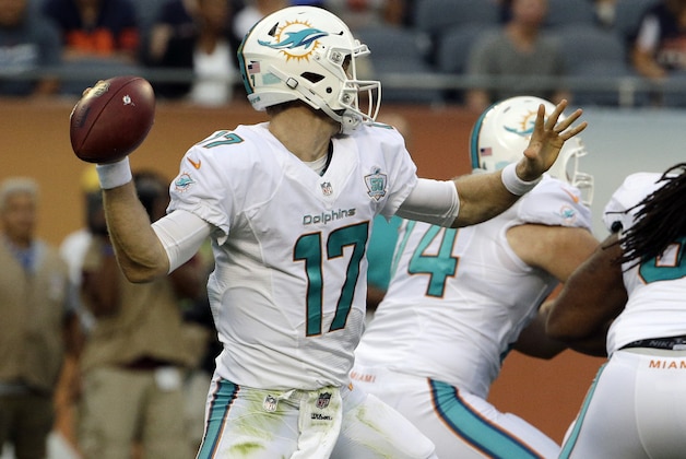 Miami Dolphins quarterback Ryan Tannehill (17) throws against the Chicago Bears in the first half of an NFL preseason football game in Chicago, Thursday, Aug. 13, 2015. (AP Photo/Nam Y. Huh)