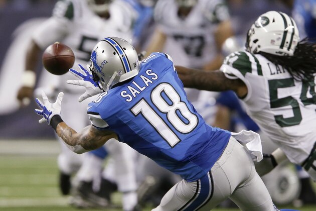 New York Jets linebacker Jamari Lattimore (54) reaches in but is unable to deflect a pass to Detroit Lions wide receiver Greg Salas (18) during the second half of an NFL preseason football game, Thursday, Aug. 13, 2015, in Detroit. (AP Photo/Duane Burleson)