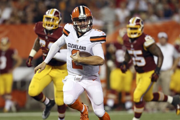 Cleveland Browns quarterback Johnny Manziel (2) scrambles for a 12-yard touchdown during the second quarter of an NFL preseason football game against the Washington Redskins, Thursday, Aug. 13, 2015, in Cleveland. (AP Photo/Ron Schwane)