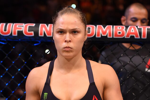 RIO DE JANEIRO, BRAZIL - AUGUST 01:  UFC strawweight champion Ronda Rousey of the United States enters the Octagon before facing Bethe Correia of Brazil in their UFC women's bantamweight championship bout during the UFC 190 event inside HSBC Arena on August 1, 2015 in Rio de Janeiro, Brazil.  (Photo by Josh Hedges/Zuffa LLC/Zuffa LLC via Getty Images)