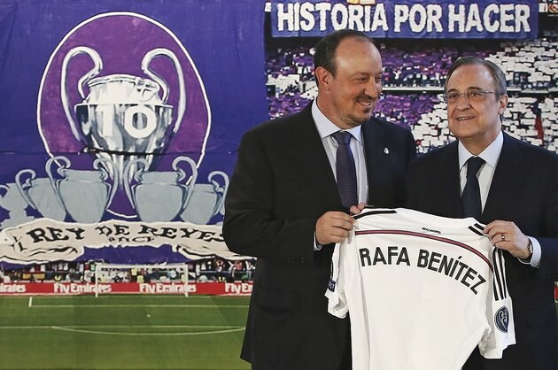 New Real Madrid coach Rafael Benitez, left, and Real Madrid's President Florentino Perez, right,  pose for a picture during his official presentation at the Santiago Bernabeu stadium in Madrid, Spain, Wednesday, June 3, 2015, after signing for Real Madrid. (AP Photo/Andres Kudacki)