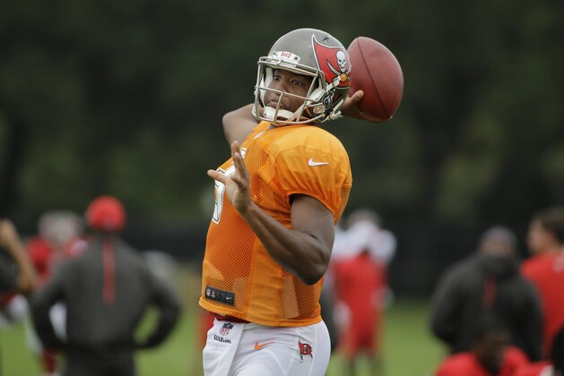 Tampa Bay Buccaneers quarterback Jameis Winston throws a pass during a Buccaneers NFL football training camp practice Monday, Aug. 3, 2015, in Tampa, Fla. (AP Photo/Chris O'Meara)