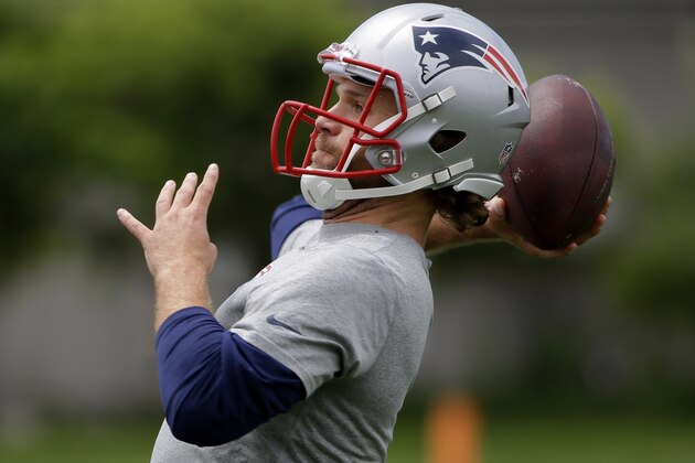 Newly acquired New England Patriots quarterback Matt Flynn (8) throws a pass during an NFL football minicamp Tuesday, June 16, 2015, in Foxborough, Mass. (AP Photo/Stephan Savoia)