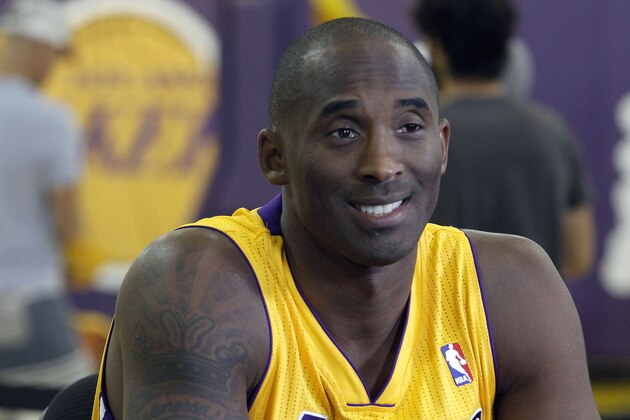 FILE - In this Sept. 28, 2013 file photo, Los Angeles Lakers guard Kobe Bryant talks during the NBA basketball teams media day, in El Segundo, Calif. The Lakers have signed Bryant to a 2-year contract extension. General manager Mitch Kupchak made the announcement Monday, Nov. 25, 2013, ending speculation that Bryant could end up with another team after this season. (AP Photo/Alex Gallardo, File)