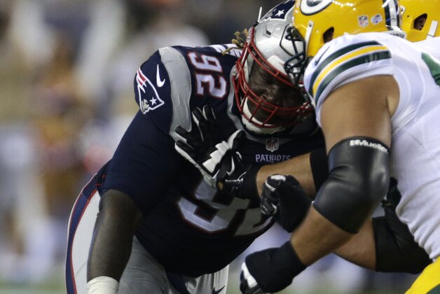 New England Patriots defensive tackle Malcom Brown (92) on the line of scrimmage in the first half of an NFL preseason football game Thursday, Aug. 13, 2015, in Foxborough, Mass. (AP Photo/Charles Krupa)