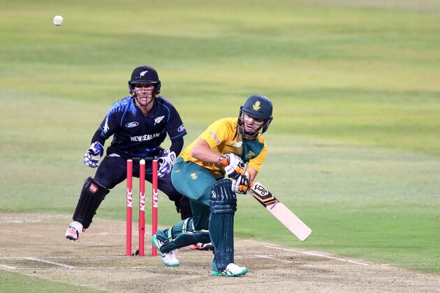 DURBAN, SOUTH AFRICA - AUGUST 14: (SOUTH AFRICA OUT) Rilleee Russouw bats as Luke Ronchi keeps wicket during the 1st KFC T20 International match between South Africa and New Zealand at Sahara Stadium Kingsmead on August 14, 2015 in Durban, South Africa. (Photo by Anesh Debiky/Gallo Images/Getty Images)