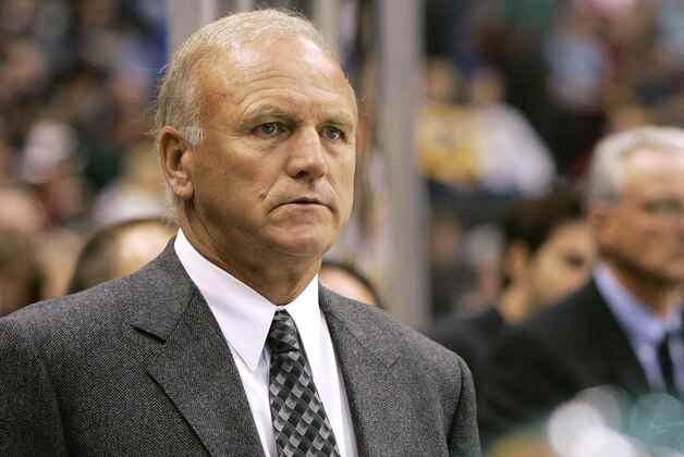 Minnesota Wild head coach Jacques Lemaire watches his team as they play the Detroit Red Wings during the third period of an NHL preseason hockey game in St. Paul, Minn., Tuesday, Sept. 19, 2006. (AP Photo/Ann Heisenfelt)