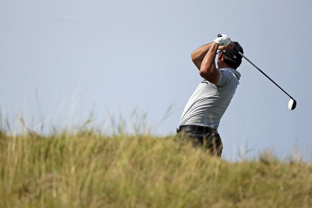Jason Day, of Australia, hits on the eighth hole during the second round of the PGA Championship golf tournament Friday, Aug. 14, 2015, at Whistling Straits in Haven, Wis. (AP Photo/Jae Hong)