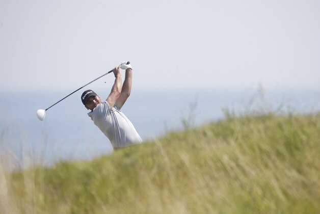 Jason Day, of Australia, hits on the fifth hole during the second round of the PGA Championship golf tournament Friday, Aug. 14, 2015, at Whistling Straits in Haven, Wis. (AP Photo/Jae Hong)
