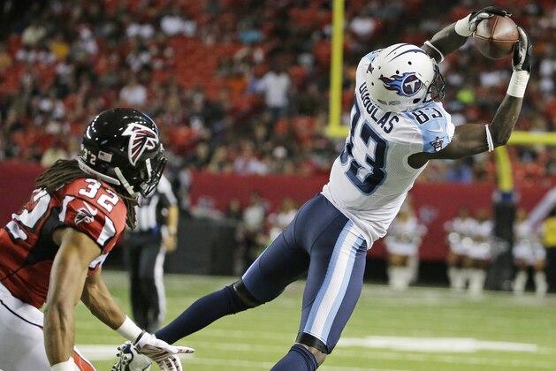 Tennessee Titans wide receiver Harry Douglas (83) makes a catch against Atlanta Falcons cornerback Jalen Collins (32) during the first half of an NFL football preseason game , Friday, Aug. 14, 2015, in Atlanta. (AP Photo/David Goldman)