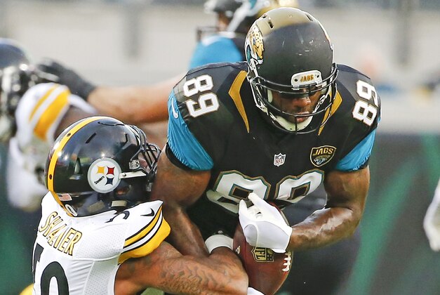 Jacksonville Jaguars tight end Marcedes Lewis, right, is stopped by Pittsburgh Steelers inside linebacker Ryan Shazier, left, after a reception during the first half of an NFL preseason football game, Friday, Aug. 14, 2015, in Jacksonville, Fla. (AP Photo/Stephen B. Morton)