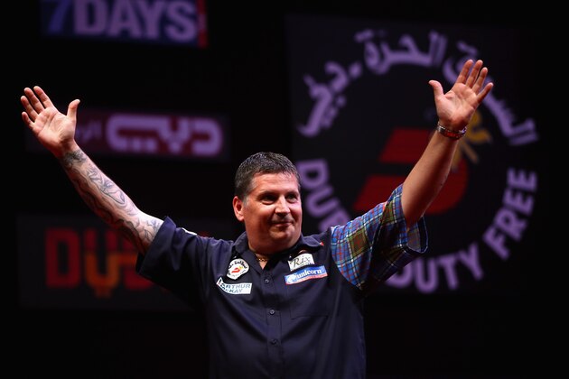 DUBAI, UNITED ARAB EMIRATES - MAY 28: Gary Anderson of Scotland celebrates after winning against James Wade of England during the 2015 Dubai Duty Free Darts Masters Quarter-Final match at Dubai Duty Free Tennis Stadium on May 28, 2015 in Dubai, United Arab Emirates.  (Photo by Francois Nel/Getty Images)