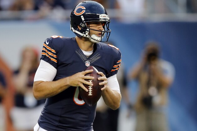Chicago Bears quarterback Jay Cutler (6) looks to pass against the Miami Dolphins during the first half of an NFL preseason football game in Chicago, Thursday, Aug. 13, 2015. (AP Photo/Charles Rex Arbogast)