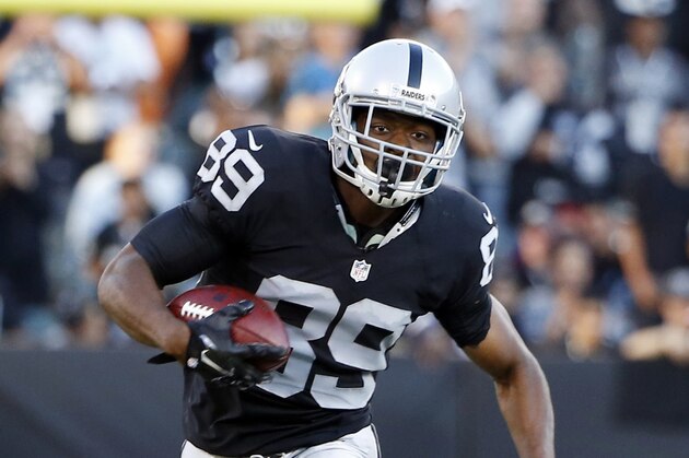 Oakland Raiders wide receiver Amari Cooper (89) runs against the St. Louis Rams during the first half of an NFL preseason football game in Oakland, Calif., Friday, Aug. 14, 2015. (AP Photo/Tony Avelar)