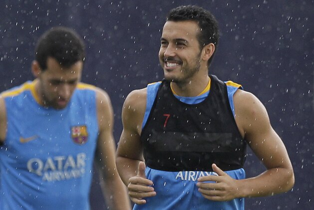 FC Barcelona's Pedro Rodriguez attends a training session one day ahead a Spanish Supercup first leg soccer match against Athletic Bilbao at the Sports Center FC Barcelona Joan Gamper in San Joan Despi, Spain, Thursday, Aug. 13, 2015. (AP Photo/Manu Fernandez)