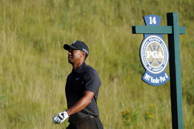 Aug 12, 2015; Sheboygan, WI, USA; Tiger Woods walks to the 14th tee during a practice round for the 2015 PGA Championship golf tournament at Whistling Straits -The Straits Course. Mandatory Credit: Thomas J. Russo-USA TODAY Sports