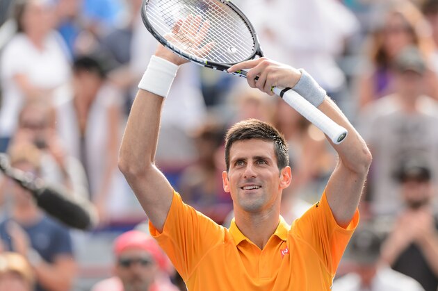 MONTREAL, ON - AUGUST 15:  Novak Djokovic of Serbia celebrates his victory against Jeremy Chardy of France during day six of the Rogers Cup at Uniprix Stadium on August 15, 2015 in Montreal, Quebec, Canada.  Novak Djokovic defeated Jeremy Chardy 6-4, 6-4.  (Photo by Minas Panagiotakis/Getty Images)