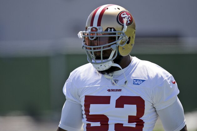 San Francisco 49ers inside linebacker NaVorro Bowman (53) waits for his turn in drills during an NFL football mini-camp Wednesday, April 29, 2015, in Santa Clara, Calif. (AP Photo/Marcio Jose Sanchez)
