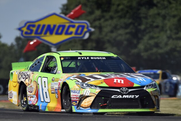 Kyle Busch in action during a NASCAR Sprint Cup series auto race at Watkins Glen International, Sunday, Aug. 9, 2015, in Watkins Glen. N.Y. (AP Photo/Derik Hamilton)