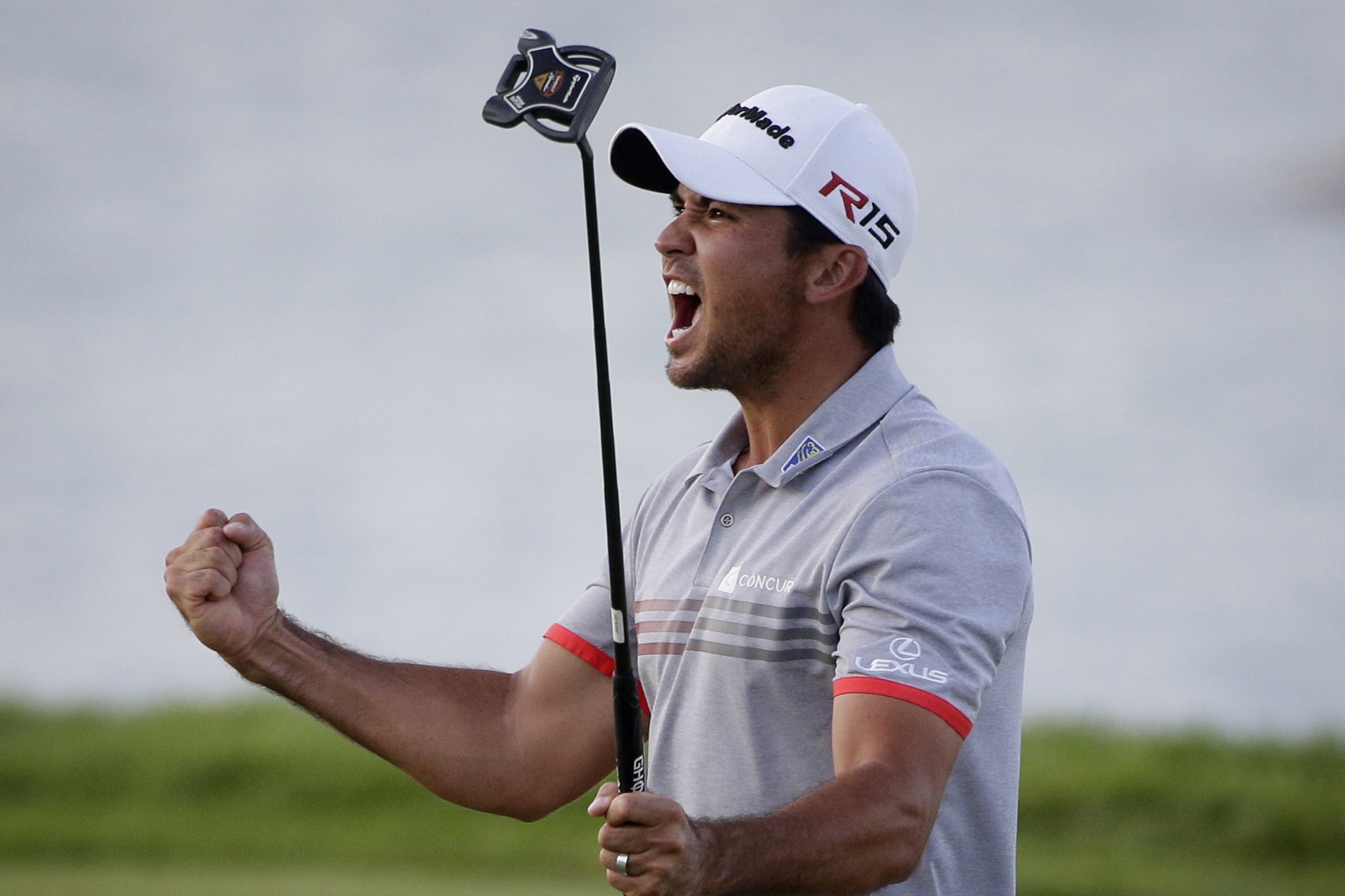Jason Day, of Australia, reacts to his birdie on the 17th hole during the third round of the PGA Championship golf tournament Saturday, Aug. 15, 2015, at Whistling Straits in Haven, Wis. (AP Photo/Jae Hong)
