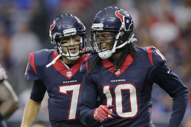 Houston Texans' Brian Hoyer (7) and DeAndre Hopkins (10) celebrate a two-point conversion against the San Francisco 49ers during the first quarter of an NFL preseason football game, Saturday, Aug. 15, 2015, in Houston. (AP Photo/Patric Schneider)