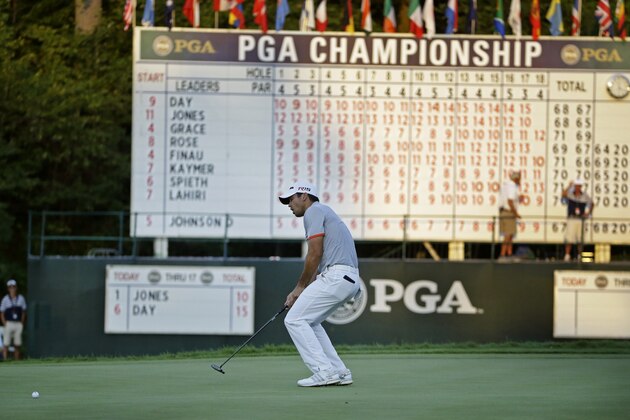 Jason Day, of Australia, reacts to a missed birdie putt on the 18th hole during the third round of the PGA Championship golf tournament Saturday, Aug. 15, 2015, at Whistling Straits in Haven, Wis. (AP Photo/Brynn Anderson)