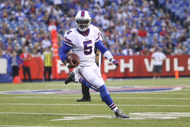Buffalo Bills quarterback Tyrod Taylor (5) runs against the Carolina Panthers during the first half of an NFL preseason football game on Friday, Aug. 14, 2015, in Orchard Park, N.Y. (AP Photo/Bill Wippert)