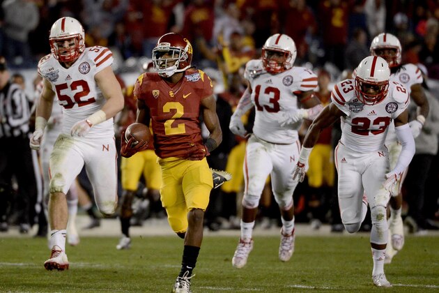 SAN DIEGO, CA-  DECEMBER 27:  Adoree' Jackson #2 of the USC Trojans runs for a touchdown en route to his team's 45-42 win over the Nebraska Cornhuskers during the 2nd half of the National University Holiday Bowl on December 27, 2014 at Qualcomm Stadium in San Diego, California. (Photo by Donald Miralle/Getty Images)