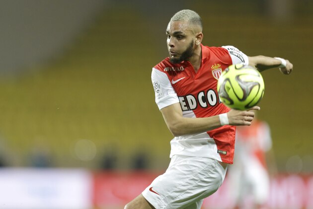 Monaco's Layvin Kurzawa controls the ball during the French League One soccer match against Bastia, in Monaco stadium, Friday, March 13, 2015. (AP Photo/Lionel Cironneau)