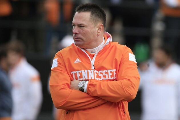 Tennessee head coach Butch Jones watches his players warm up before an NCAA college football game against Vanderbilt Saturday, Nov. 29, 2014, in Nashville, Tenn. (AP Photo/Mark Humphrey)