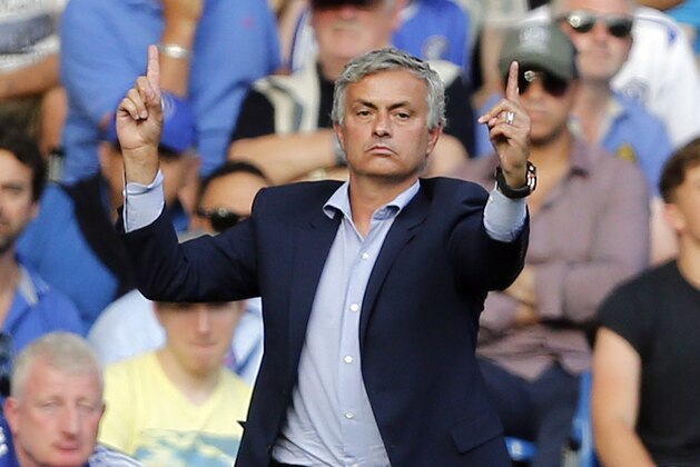 Chelsea's manager Jose Mourinho gestures during the English Premier League soccer match between Chelsea and Swansea City at Stamford Bridge stadium in London, Saturday, Aug. 8, 2015.(AP Photo/Frank Augstein)