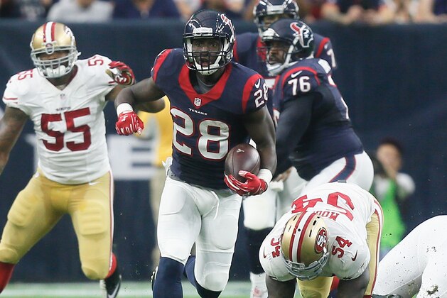 HOUSTON, TX - AUGUST 15:  Alfred Blue #28 of the Houston Texans rushes past Nick Moody #54 of the San Francisco 49ers at Reliant Arena at Reliant Park on August 15, 2015 in Houston, Texas.  (Photo by Bob Levey/Getty Images)