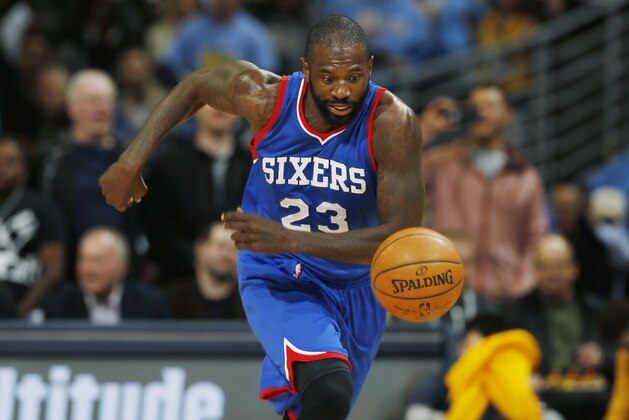 Philadelphia 76ers guard Jason Richardson pursues a loose ball against the Denver Nuggets in the first quarter of an NBA basketball game Wednesday, March 25, 2015, in Denver. (AP Photo/David Zalubowski)
